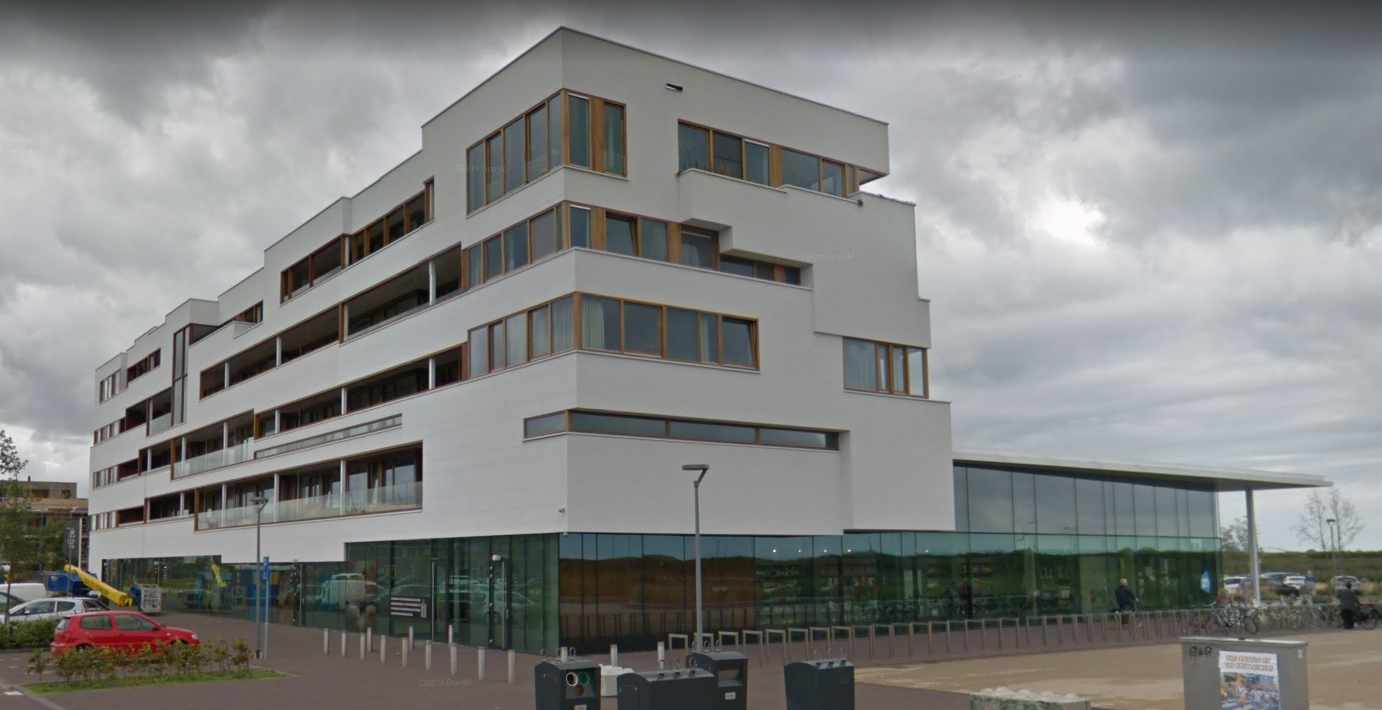 Isolgomma-Shopping center “Albert Heijn” and residential complex